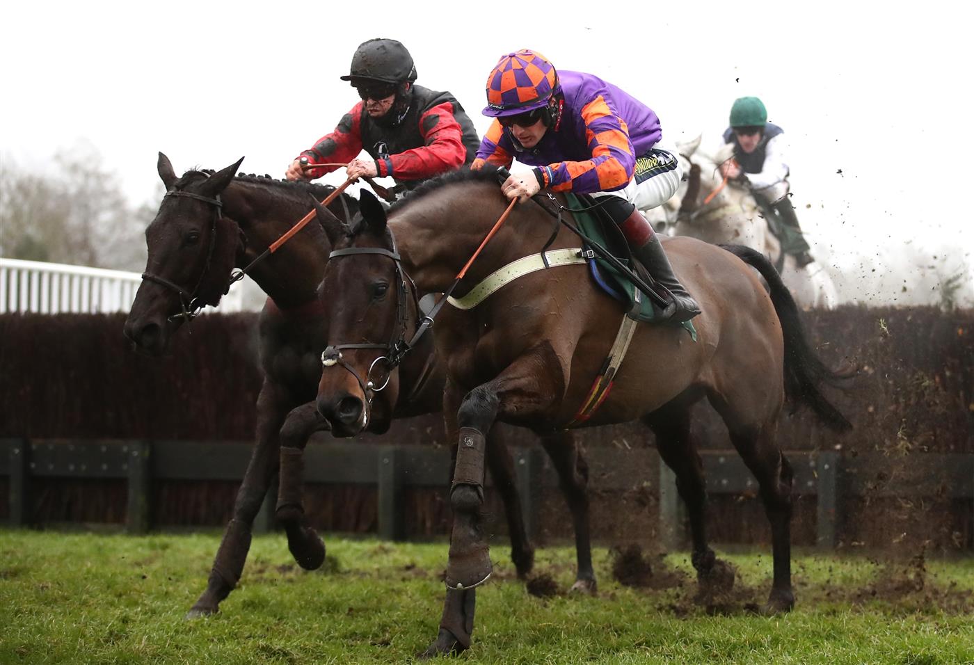 CATTERICK, ENGLAND - FEBRUARY 05: Quick Wave ridden by jockey Robert Dunne (left) on their way to winning the Meetings That Matter On Racing TV Mares' Handicap Chase ahead of Whatsdastory ridden by jockey Sam Twiston-Davies at Catterick Racecourseon February 5, 2021 in Catterick, England. (Photo by Tim Goode - Pool / Getty Images)