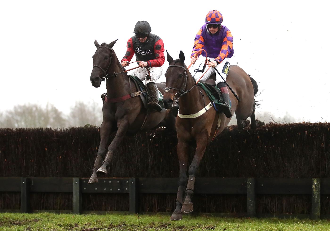 CATTERICK, ENGLAND - FEBRUARY 05: Quick Wave ridden by jockey Robert Dunne (left) on their way to winning the Meetings That Matter On Racing TV Mares' Handicap Chase ahead of Whatsdastory ridden by jockey Sam Twiston-Davies at Catterick Racecourseon February 5, 2021 in Catterick, England. (Photo by Tim Goode - Pool / Getty Images)