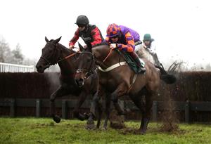 CATTERICK, ENGLAND - FEBRUARY 05: Quick Wave ridden by jockey Robert Dunne (left) and Whatsdastory ridden by jockey Sam Twiston-Davies during the Meetings That Matter On Racing TV Mares' Handicap Chase at Catterick Racecourse on February 5, 2021 in Catterick, England. (Photo by Tim Goode - Pool / Getty Images)