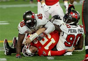 TAMPA, FLORIDA - FEBRUARY 07: Patrick Mahomes #15 of the Kansas City Chiefs is tackled in the fourth quarter by Jason Pierre-Paul #90 and Devin White #45 of the Tampa Bay Buccaneers in Super Bowl LV at Raymond James Stadium on February 07, 2021 in Tampa, Florida. (Photo by Patrick Smith/Getty Images)