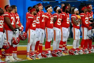 TAMPA, FLORIDA - FEBRUARY 07: The Kansas City Chiefs stand for a pre-game song before Super Bowl LV against the Tampa Bay Buccaneers at Raymond James Stadium on February 07, 2021 in Tampa, Florida. (Photo by Mike Ehrmann/Getty Images)