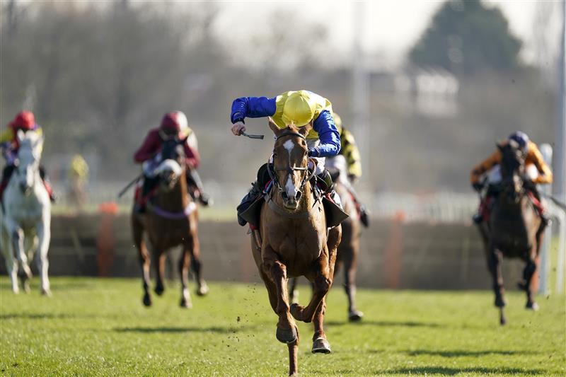 SUNBURY, ENGLAND - FEBRUARY 27: Ciaran Gethings riding Hometown Boy clear the last to win The Close Brothers Asset Finance Handicap Hurdle at Kempton Park Racecourse on February 27, 2021 in Sunbury, England. Due to the coronavirus pandemic, owners along with the paying public will not be allowed to attend the meeting. (Photo by Alan Crowhurst/Getty Images)
