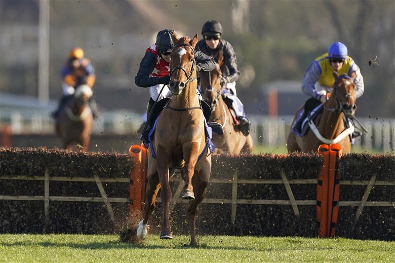 SUNBURY, ENGLAND - FEBRUARY 27: Jonjo O'Neill Jr riding Cape Gentleman (red/black) clear the last to win The Sky Bet Dovecote Novices' Hurdle at Kempton Park Racecourse on February 27, 2021 in Sunbury, England. Due to the coronavirus pandemic, owners along with the paying public will not be allowed to attend the meeting. (Photo by Alan Crowhurst/Getty Images)