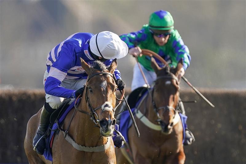 SUNBURY, ENGLAND - FEBRUARY 27: Harry Cobden riding Tamaroc Du Mathan clear the last to win The Close Brothers Pendil Novices' Chase at Kempton Park Racecourse on February 27, 2021 in Sunbury, England. Due to the coronavirus pandemic, owners along with the paying public will not be allowed to attend the meeting. (Photo by Alan Crowhurst/Getty Images)