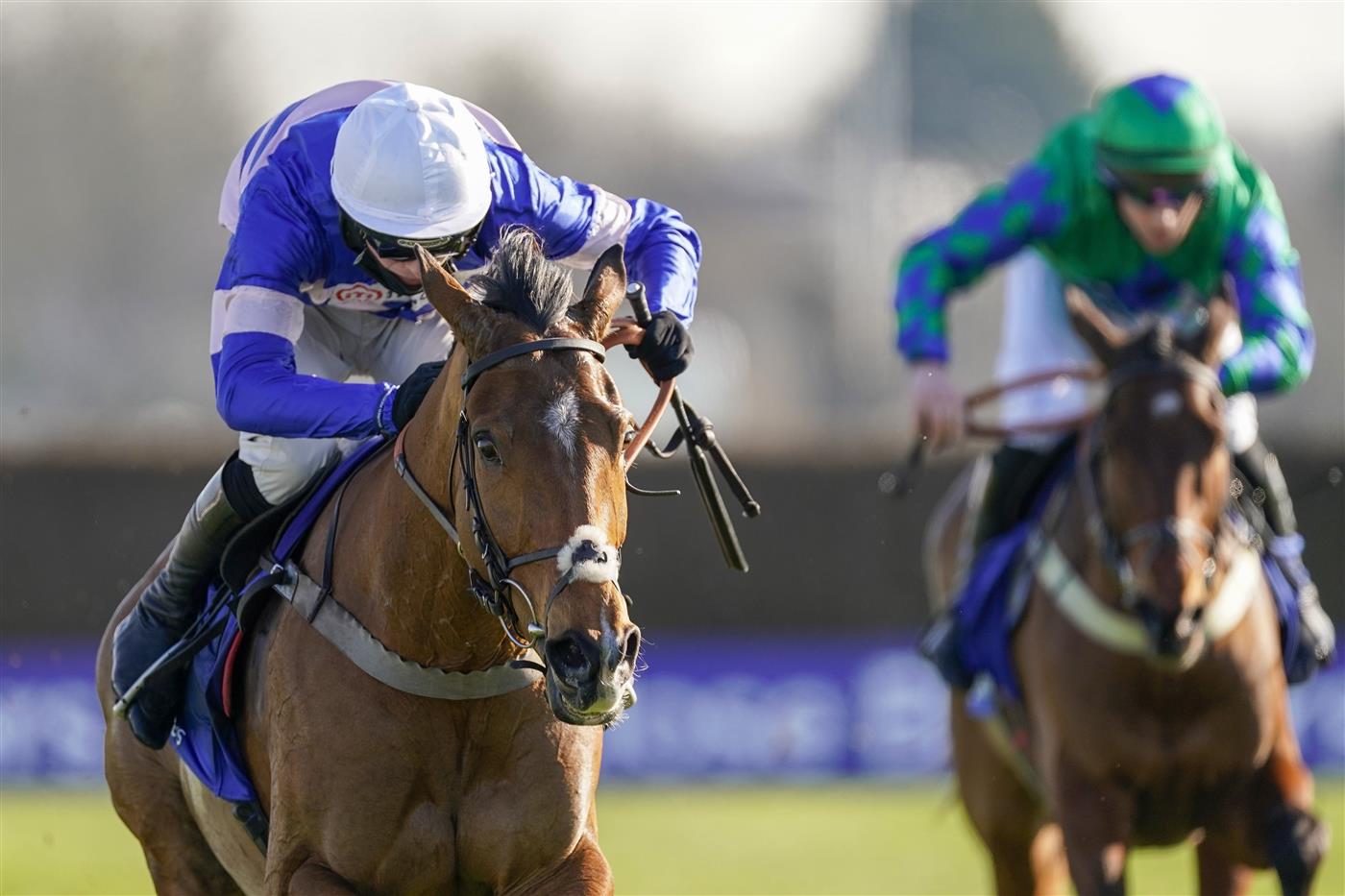 SUNBURY, ENGLAND - FEBRUARY 27: Harry Cobden riding Tamaroc Du Mathan clear the last to win The Close Brothers Pendil Novices' Chase at Kempton Park Racecourse on February 27, 2021 in Sunbury, England. Due to the coronavirus pandemic, owners along with the paying public will not be allowed to attend the meeting. (Photo by Alan Crowhurst/Getty Images)