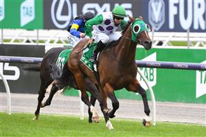 MELBOURNE, AUSTRALIA - FEBRUARY 27: Damian Lane riding Morvada winning Race 3, the The Tab Shaftesbury Avenue Handicap, during Melbourne Racing at Flemington Racecourse on February 27, 2021 in Melbourne, Australia. (Photo by Vince Caligiuri/Getty Images)