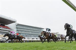 MELBOURNE, AUSTRALIA - FEBRUARY 27: Michael Dee riding Lunar Fox winning Race 7, the Kennedy Australian Guineas, during Melbourne Racing at Flemington Racecourse on February 27, 2021 in Melbourne, Australia. (Photo by Vince Caligiuri/Getty Images)