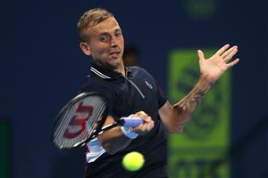 DOHA, QATAR - MARCH 10: Dan Evans of Great Britain returns a forehand in his match against Roger Federer of Switzerland on Day 3 of the Qatar ExxonMobil Open at Khalifa International Tennis and Squash Complex on March 10, 2021 in Doha, Qatar. (Photo by Mohamed Farag/Getty Images)