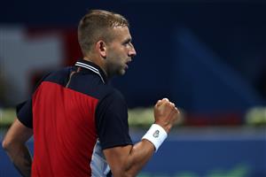 DOHA, QATAR - MARCH 10: Dan Evans of Great Britain celebrates a point in his match against Roger Federer of Switzerland on Day 3 of the Qatar ExxonMobil Open at Khalifa International Tennis and Squash Complex on March 10, 2021 in Doha, Qatar. (Photo by Mohamed Farag/Getty Images)