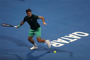 DOHA, QATAR - MARCH 10: Roger Federer of Switzerland returns a forehand in his match against Dan Evans of Great Britain on Day 3 of the Qatar ExxonMobil Open at Khalifa International Tennis and Squash Complex on March 10, 2021 in Doha, Qatar. (Photo by Mohamed Farag/Getty Images)