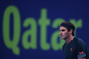 DOHA, QATAR - MARCH 10: Roger Federer of Switzerland looks on in his match against Dan Evans of Great Britain on Day 3 of the Qatar ExxonMobil Open at Khalifa International Tennis and Squash Complex on March 10, 2021 in Doha, Qatar. (Photo by Mohamed Farag/Getty Images)