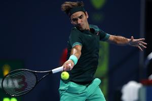 DOHA, QATAR - MARCH 10: Roger Federer of Switzerland returns a forehand in his match against Dan Evans of Great Britain on Day 3 of the Qatar ExxonMobil Open at Khalifa International Tennis and Squash Complex on March 10, 2021 in Doha, Qatar. (Photo by Mohamed Farag/Getty Images)