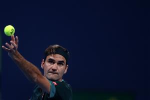DOHA, QATAR - MARCH 10: Roger Federer of Switzerland serves in his match against Dan Evans of Great Britain on Day 3 of the Qatar ExxonMobil Open at Khalifa International Tennis and Squash Complex on March 10, 2021 in Doha, Qatar. (Photo by Mohamed Farag/Getty Images)