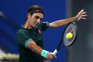 DOHA, QATAR - MARCH 10: Roger Federer of Switzerland returns a backhand in his match against Dan Evans of Great Britain on Day 3 of the Qatar ExxonMobil Open at Khalifa International Tennis and Squash Complex on March 10, 2021 in Doha, Qatar. (Photo by Mohamed Farag/Getty Images)