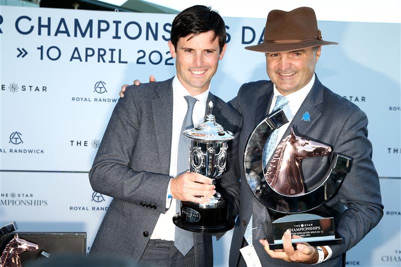 SYDNEY, AUSTRALIA - APRIL 10: James Cummings (L), trainer of Cascadian and Vin Cox, Managing Director of Godolphin Australia celebrate after winning race 9 The Star Doncaster Mile during The Championships at Royal Randwick Racecourse on April 10, 2021 in Sydney, Australia. (Photo by Jason McCawley/Getty Images for the Australian Turf Club)
