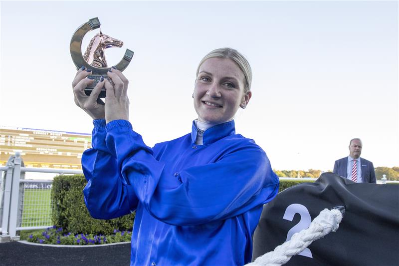 SYDNEY, AUSTRALIA - APRIL 10: Jamie Kah poses with the trophy after winning The Star Doncaster Mile on Cascadian during the Championships Day 1 at Royal Randwick Racecourse on April 10, 2021 in Sydney, Australia. A COVID-restricted crowd of 15,000 is expected to attend Day 1 of The Championships, the highlight of the Sydney Autumn Racing Carnival. The 2020 event was restricted to participants and essential staff only in the height of the coronavirus pandemic. The Championships Day 1 featuring four Group 1 events headlined by the $3 million Doncaster Mile and $2 million Australian Derby. (Photo by Jenny Evans/Getty Images)