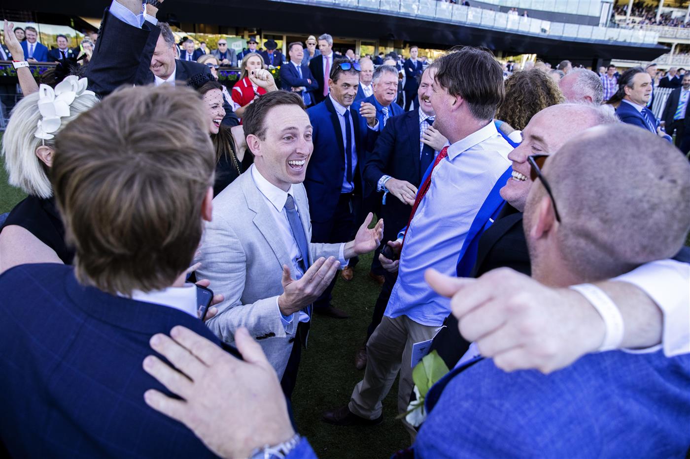 SYDNEY, AUSTRALIA - APRIL 10: Winning connections react after their horse Explosive Jack won the Bentley Australian Derby during the Championships Day 1 at Royal Randwick Racecourse on April 10, 2021 in Sydney, Australia. A COVID-restricted crowd of 15,000 is expected to attend Day 1 of The Championships, the highlight of the Sydney Autumn Racing Carnival. The 2020 event was restricted to participants and essential staff only in the height of the coronavirus pandemic. The Championships Day 1 featuring four Group 1 events headlined by the $3 million Doncaster Mile and $2 million Australian Derby. (Photo by Jenny Evans/Getty Images)