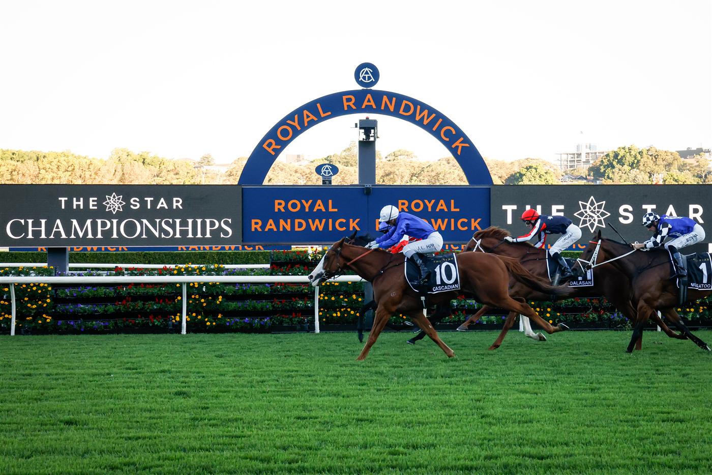 SYDNEY, AUSTRALIA - APRIL 10:  Jamie Kah on Cascadian (white cap) wins race 9 the Star Doncaster Mile during during The Championships at Royal Randwick Racecourse on April 10, 2021 in Sydney, Australia. (Photo by Hanna Lassen/Getty Images)