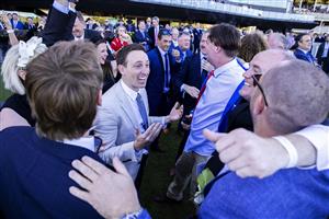 SYDNEY, AUSTRALIA - APRIL 10: Winning connections react after their horse Explosive Jack won the Bentley Australian Derby during the Championships Day 1 at Royal Randwick Racecourse on April 10, 2021 in Sydney, Australia. A COVID-restricted crowd of 15,000 is expected to attend Day 1 of The Championships, the highlight of the Sydney Autumn Racing Carnival. The 2020 event was restricted to participants and essential staff only in the height of the coronavirus pandemic. The Championships Day 1 featuring four Group 1 events headlined by the $3 million Doncaster Mile and $2 million Australian Derby. (Photo by Jenny Evans/Getty Images)