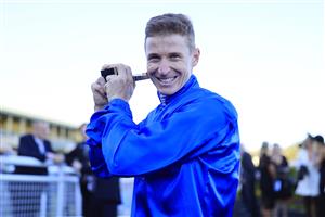 SYDNEY, AUSTRALIA - APRIL 10: James McDonald holds up his trophy after winning race 6 the Inglis Sires’ on Anamoe during The Championships at Royal Randwick Racecourse on April 10, 2021 in Sydney, Australia. (Photo by Mark Evans/Getty Images)