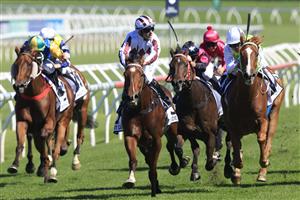 SYDNEY, AUSTRALIA - APRIL 10: Tommy Berry on Art Cadeau wins race 3 the Newhaven Park Country Championships Final during The Championships at Royal Randwick Racecourse on April 10, 2021 in Sydney, Australia. (Photo by Mark Evans/Getty Images)