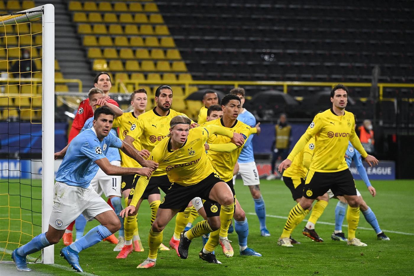 TOPSHOT - Players including Dortmund's Norwegian forward Erling Braut Haaland scramble during a corner kick during the UEFA Champions League quarter-final second leg football match between BVB Borussia Dortmund and Manchester City in Dortmund, western Germany, on April 14, 2021. (Photo by Ina Fassbender / various sources / AFP) (Photo by INA FASSBENDER/AFP via Getty Images)