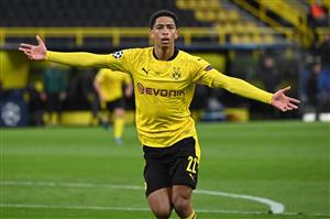 Dortmund's English midfielder Jude Bellingham celebrates scoring the opening goal during the UEFA Champions League quarter-final second leg football match between BVB Borussia Dortmund and Manchester City in Dortmund, western Germany, on April 14, 2021. (Photo by Ina Fassbender / various sources / AFP) (Photo by INA FASSBENDER/AFP via Getty Images)