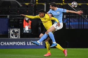 Dortmund's German forward Ansgar Knauff (L) and Manchester City's Portuguese defender Ruben Dias vie for the ball during the UEFA Champions League quarter-final second leg football match between BVB Borussia Dortmund and Manchester City in Dortmund, western Germany, on April 14, 2021. (Photo by Ina Fassbender / various sources / AFP) (Photo by INA FASSBENDER/AFP via Getty Images)