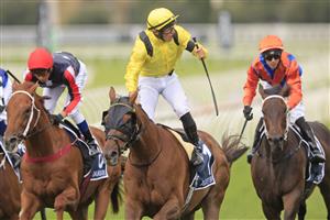 SYDNEY, AUSTRALIA - APRIL 17: Tom Marquand on Addeybb wins race 8 the Longines Queen Elizabeth Stakesduring day two of The Championships at Royal Randwick Racecourse on April 17, 2021 in Sydney, Australia. (Photo by Mark Evans/Getty Images)
