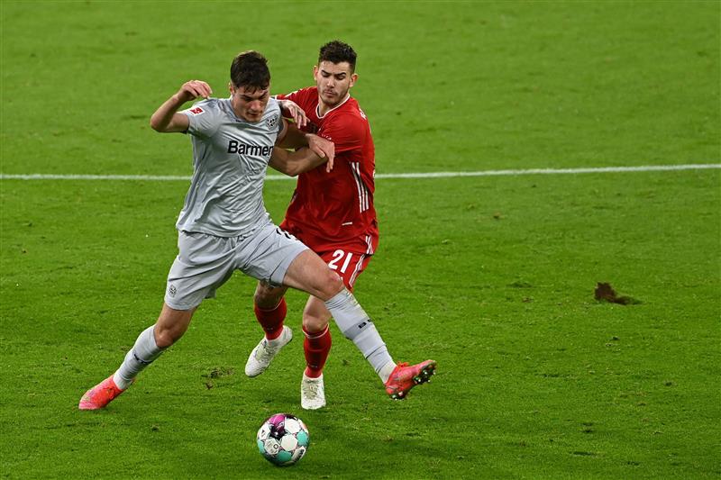 Leverkusen's Czech forward Patrik Schick (L) and Bayern Munich's French defender Lucas Hernandez vie for the ball during the German first division Bundesliga football match FC Bayern Munich vs Bayer 04 Leverkusen in Munich, southern Germany, on April 20, 2021.  (Getty Images)