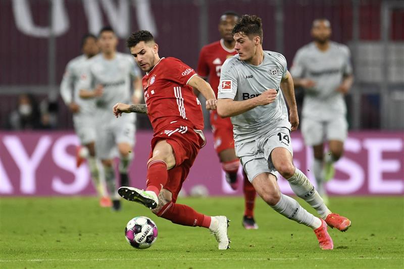 Bayern Munich's French defender Lucas Hernandez (L) and Leverkusen's Czech forward Patrik Schick vie for the ball during the German first division Bundesliga football match FC Bayern Munich vs Bayer 04 Leverkusen in Munich, southern Germany, on April 20, 2021.  (Getty Images)