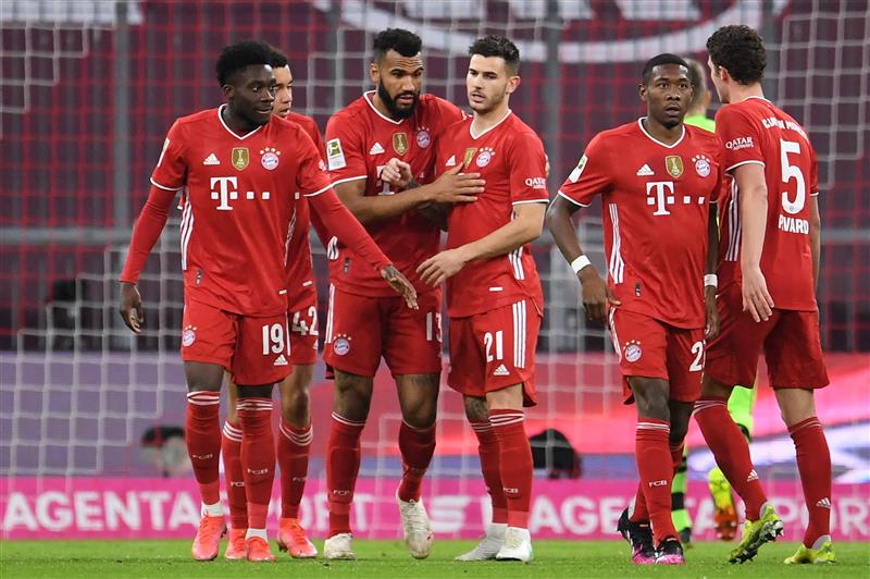 Bayern Munich's Cameroonian forward Eric Maxim Choupo-Moting (2L) celebrates with teammates after scoring the opening goal during the German first division Bundesliga football match FC Bayern Munich vs Bayer 04 Leverkusen in Munich, southern Germany, on April 20, 2021.  (Getty Images)