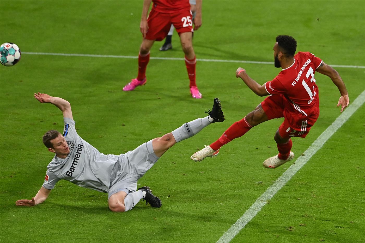 Bayern Munich's Cameroonian forward Eric Maxim Choupo-Moting (R) scores the opening goal during the German first division Bundesliga football match FC Bayern Munich vs Bayer 04 Leverkusen in Munich, southern Germany, on April 20, 2021.  (Getty Images)