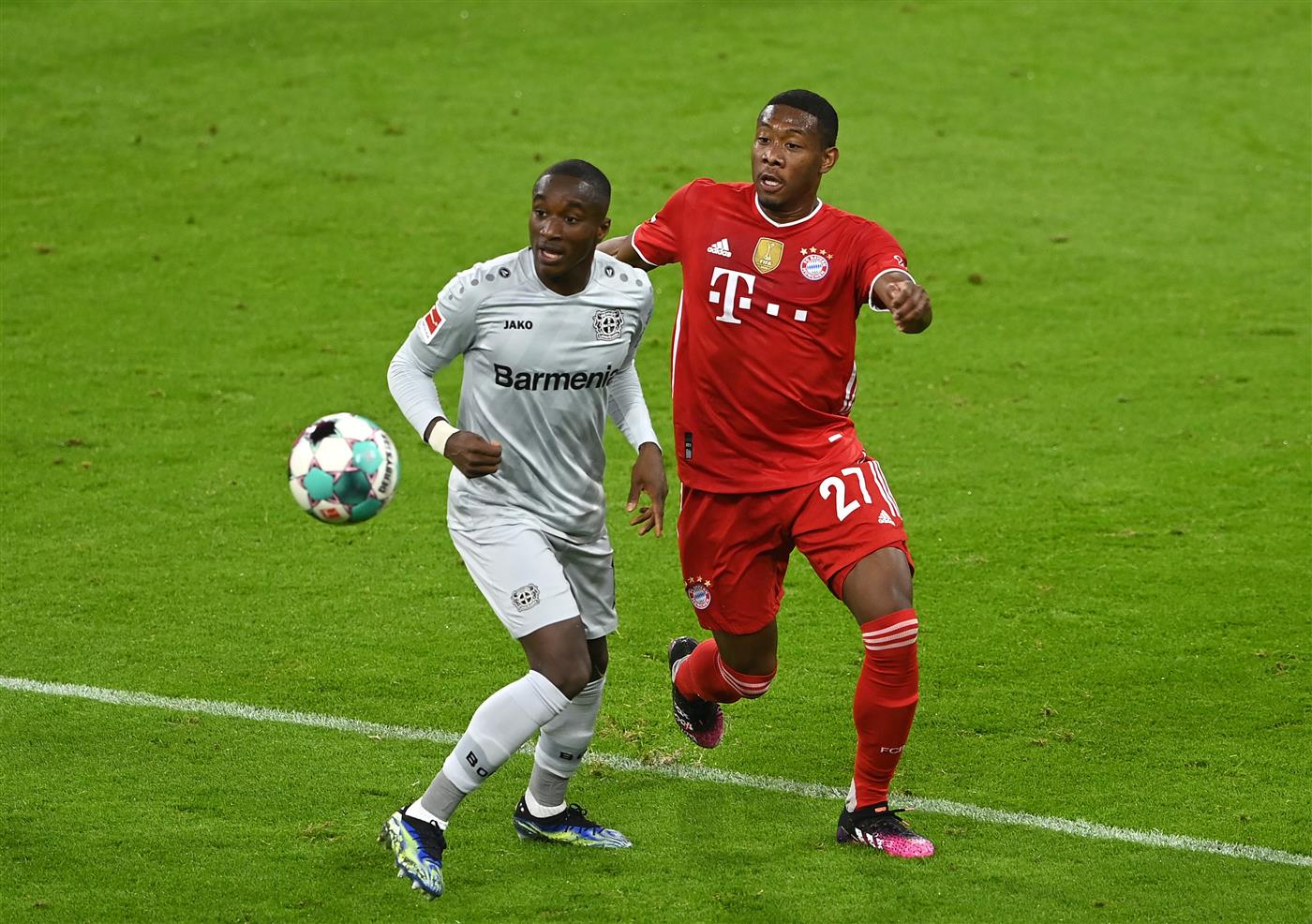 MUNICH, GERMANY - APRIL 20: Moussa Diaby of Bayer 04 Leverkusen is challenged by David Alaba of FC Bayern Muenchen during the Bundesliga match between FC Bayern Muenchen and Bayer 04 Leverkusen at Allianz Arena on April 20, 2021 in Munich, Germany.  (Getty Images)