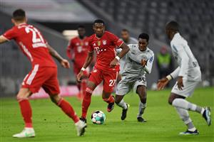 Bayern Munich's Austrian defender David Alaba (2L) and Leverkusen's Dutch defender Jeremie Frimpong (2R) vie for the ball during the German first division Bundesliga football match FC Bayern Munich vs Bayer 04 Leverkusen in Munich, southern Germany, on April 20, 2021. (Getty Images)