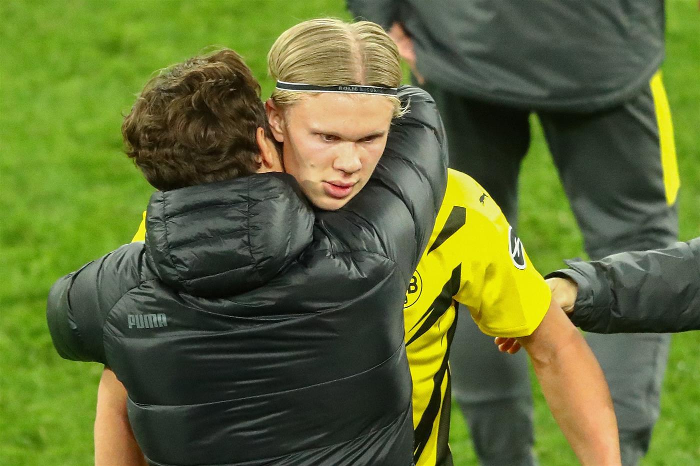 Dortmund's coach Edin Terzic (L) embraces Dortmund's Norwegian forward Erling Braut Haaland after the German first division Bundesliga football match Borussia Dortmund vs 1. FC Union, in Dortmund, western Germany, on April 21, 2021. (Getty Images)
