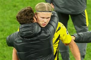 Dortmund's coach Edin Terzic (L) embraces Dortmund's Norwegian forward Erling Braut Haaland after the German first division Bundesliga football match Borussia Dortmund vs 1. FC Union, in Dortmund, western Germany, on April 21, 2021. (Getty Images)