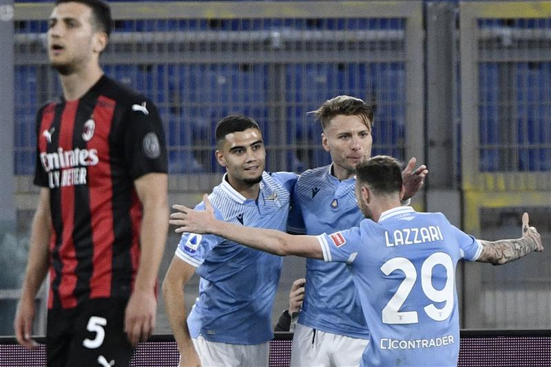 Lazio's Italian forward Ciro Immobile (2nd R) celebrates after scoring a goal during the Italian Serie A football match between Lazio and Ac Milan on April 26, 2021 at the Olympic stadium in Rome. (Getty Images)