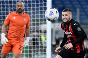 AC Milan's Croatian forward Ante Rebic (R) eyes the ball during the Italian Serie A football match between Lazio and Ac Milan on April 26, 2021 at the Olympic stadium in Rome. (Getty Images)