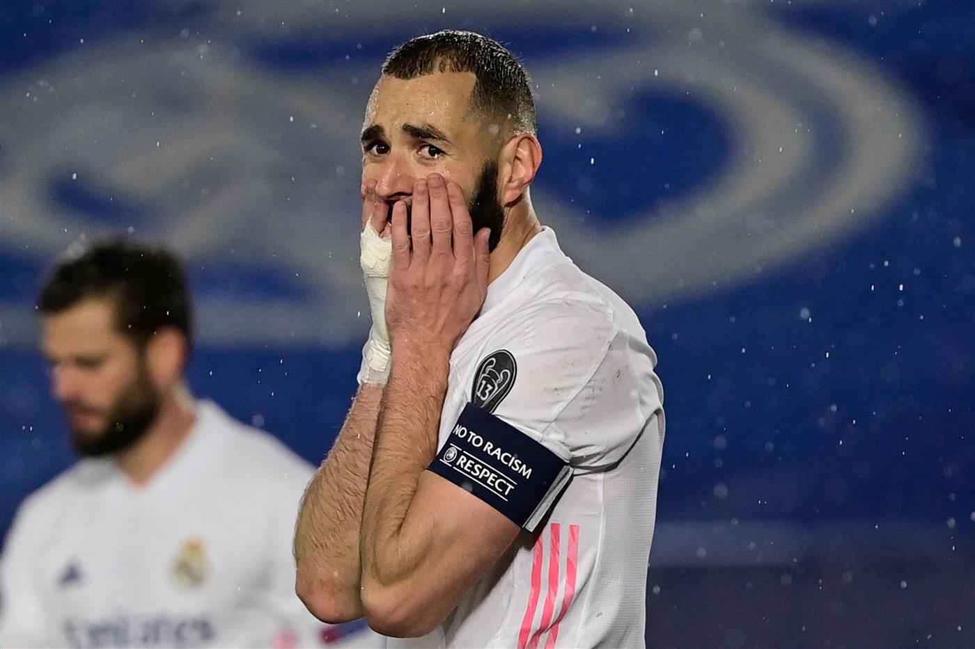 TOPSHOT - Real Madrid's French forward Karim Benzema gestures during the UEFA Champions League semi-final first leg football match between Real Madrid and Chelsea at the Alfredo di Stefano stadium in Valdebebas, on the outskirts of Madrid, on April 27, 2021. (Getty Images)