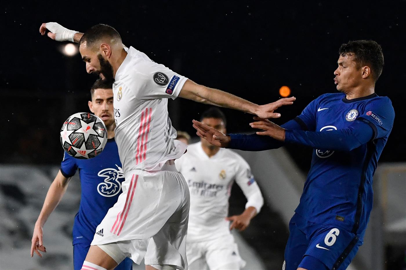 TOPSHOT - Real Madrid's French forward Karim Benzema vies with Chelsea's Brazilian defender Thiago Silva (R) during the UEFA Champions League semi-final first leg football match between Real Madrid and Chelsea at the Alfredo di Stefano stadium in Valdebebas, on the outskirts of Madrid, on April 27, 2021. (Getty Images)