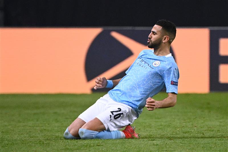 Manchester City's Algerian midfielder Riyad Mahrez celebrates after scoring a goal during the UEFA Champions League first leg semi-final football match between Paris Saint-Germain (PSG) and Manchester City at the Parc des Princes stadium in Paris on April 28, 2021. (Getty Images)