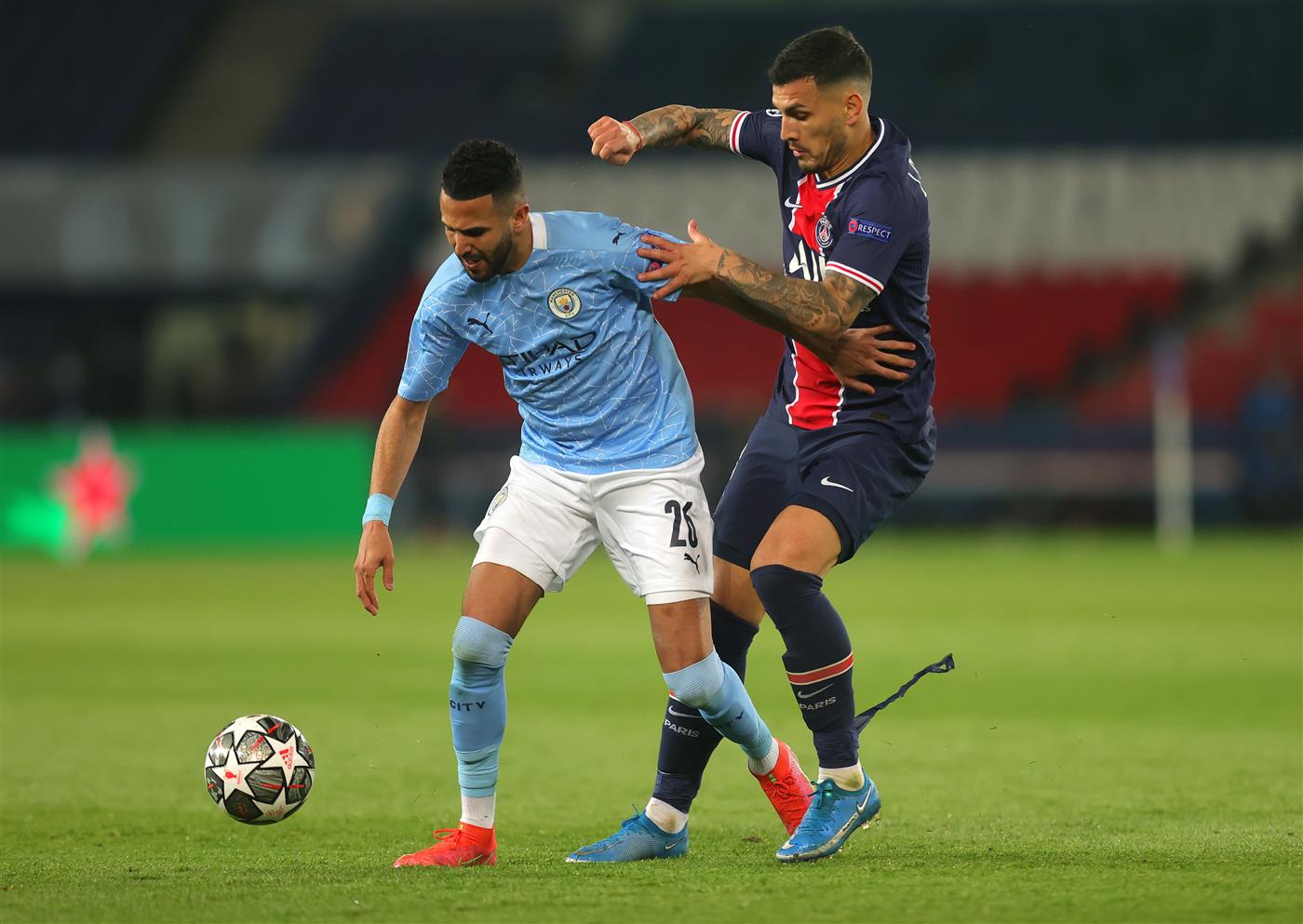 PARIS, FRANCE - APRIL 28: Riyad Mahrez of Manchester City battles for possession with Leandro Paredes of Paris Saint-Germain during the UEFA Champions League Semi Final First Leg match between Paris Saint-Germain and Manchester City  at Parc des Princes on April 28, 2021 in Paris, France. (Getty Images)