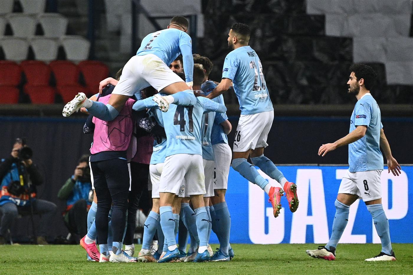 Manchester City's players celebrate after scoring a goal during the UEFA Champions League first leg semi-final football match between Paris Saint-Germain (PSG) and Manchester City at the Parc des Princes stadium in Paris on April 28, 2021. (Getty Images)