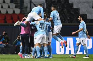 Manchester City's players celebrate after scoring a goal during the UEFA Champions League first leg semi-final football match between Paris Saint-Germain (PSG) and Manchester City at the Parc des Princes stadium in Paris on April 28, 2021. (Getty Images)