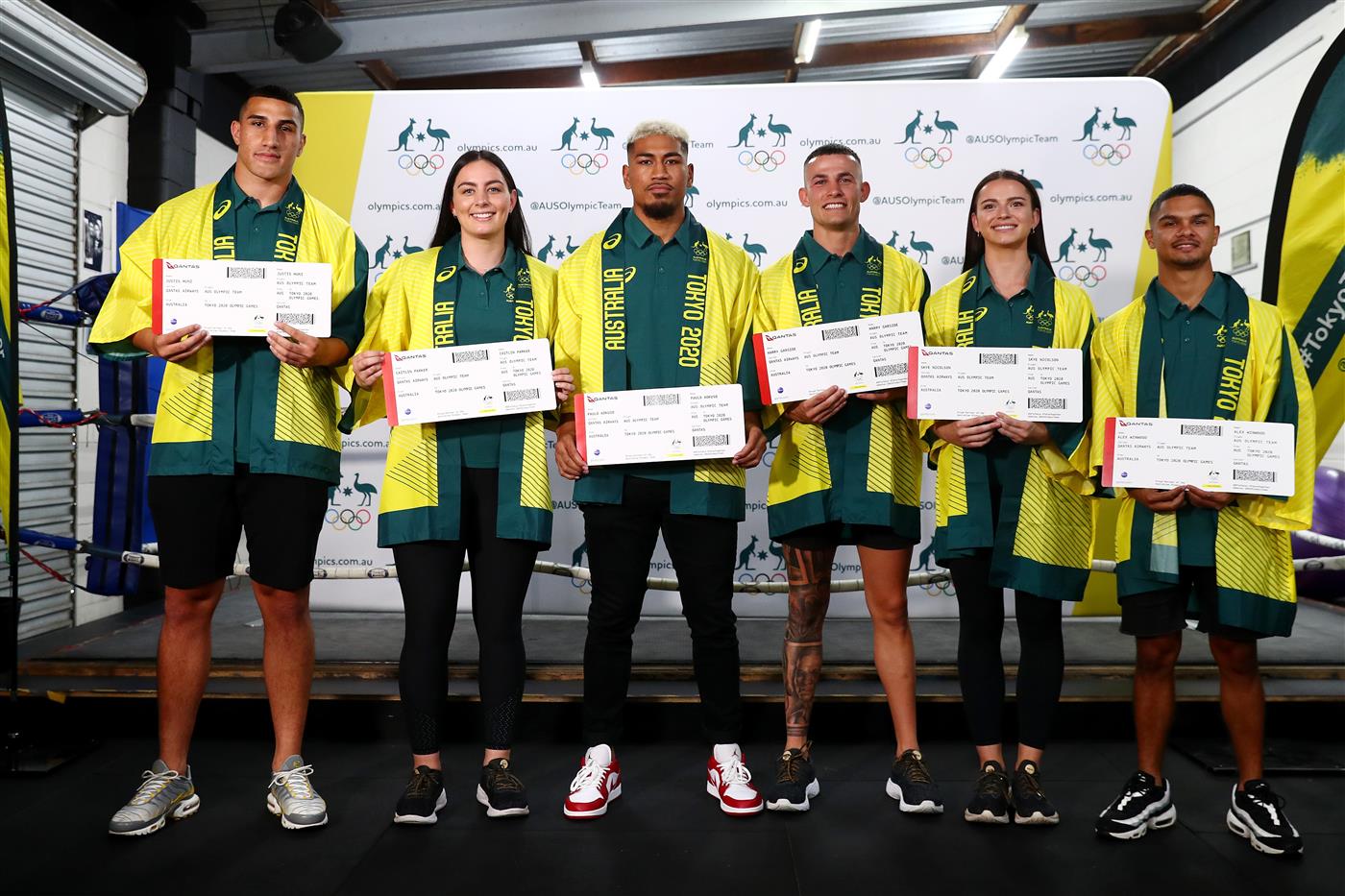GOLD COAST, AUSTRALIA - MAY 04: Justis Huni, Caitlin Park, Paulo Aokuso, Harry Garside, Skye Nicolson and  Alex Winwood pose after the announcement of the Australian boxing squad for the 2020 Tokyo Olympic Games, at Gold COast PCYC on May 04, 2021 in Gold Coast, Australia. (Getty Images)