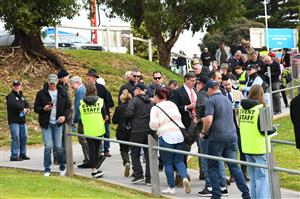 WARRNAMBOOL, AUSTRALIA - MAY 06: General view of racegoers arriving and scanning QR code for covid protocols during Grand Annual Day during the Warrnambool Jumps Carnival at Warrnambool Racing Club on May 06, 2021 in Warrnambool, Australia. (Photo by Vince Caligiuri/Getty Images)