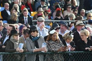 WARRNAMBOOL, AUSTRALIA - MAY 06: General view of racegoers on Grand Annual Day during the Warrnambool Jumps Carnival at Warrnambool Racing Club on May 06, 2021 in Warrnambool, Australia. (Photo by Vince Caligiuri/Getty Images)