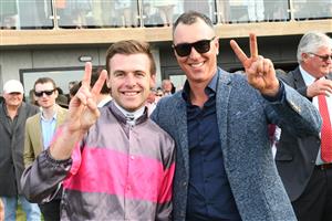 WARRNAMBOOL, AUSTRALIA - MAY 06: Clayton Douglas and trainer Symon Wilde after Gold Medals won Race 7, the Grand Annual Steeplechase, on Grand Annual Day during the Warrnambool Jumps Carnival at Warrnambool Racing Club on May 06, 2021 in Warrnambool, Australia. (Photo by Vince Caligiuri/Getty Images)
