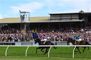 WARRNAMBOOL, AUSTRALIA - MAY 06: Clayton Douglas riding Gold Medals defeating Aaron Kuru riding Zed Em in Race 7, the Grand Annual Steeplechase, on Grand Annual Day during the Warrnambool Jumps Carnival at Warrnambool Racing Club on May 06, 2021 in Warrnambool, Australia. (Photo by Vince Caligiuri/Getty Images)